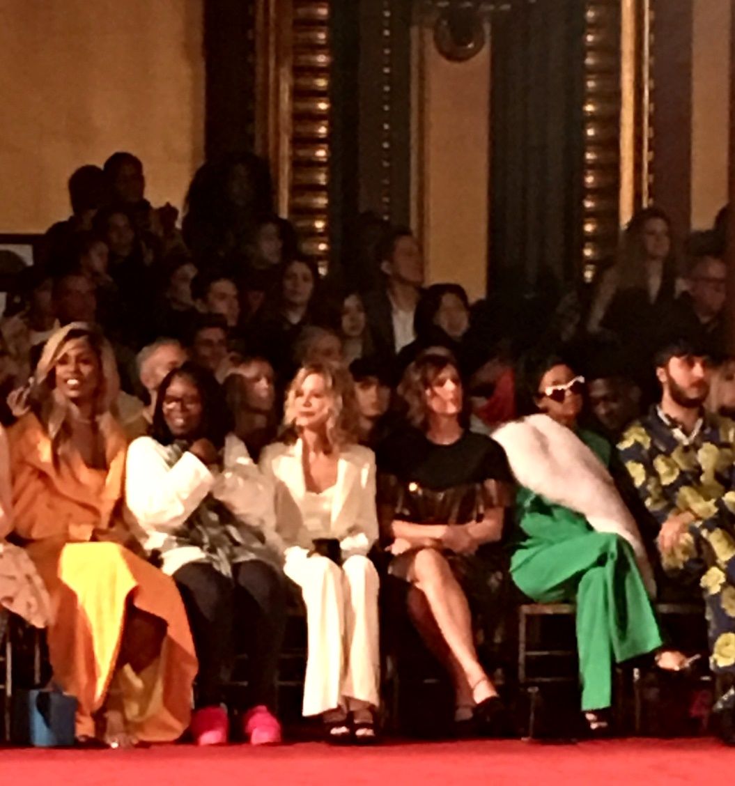 Fashion show front row of seated attendees