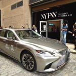 Silver Lexus parked outside NYFW fashion show