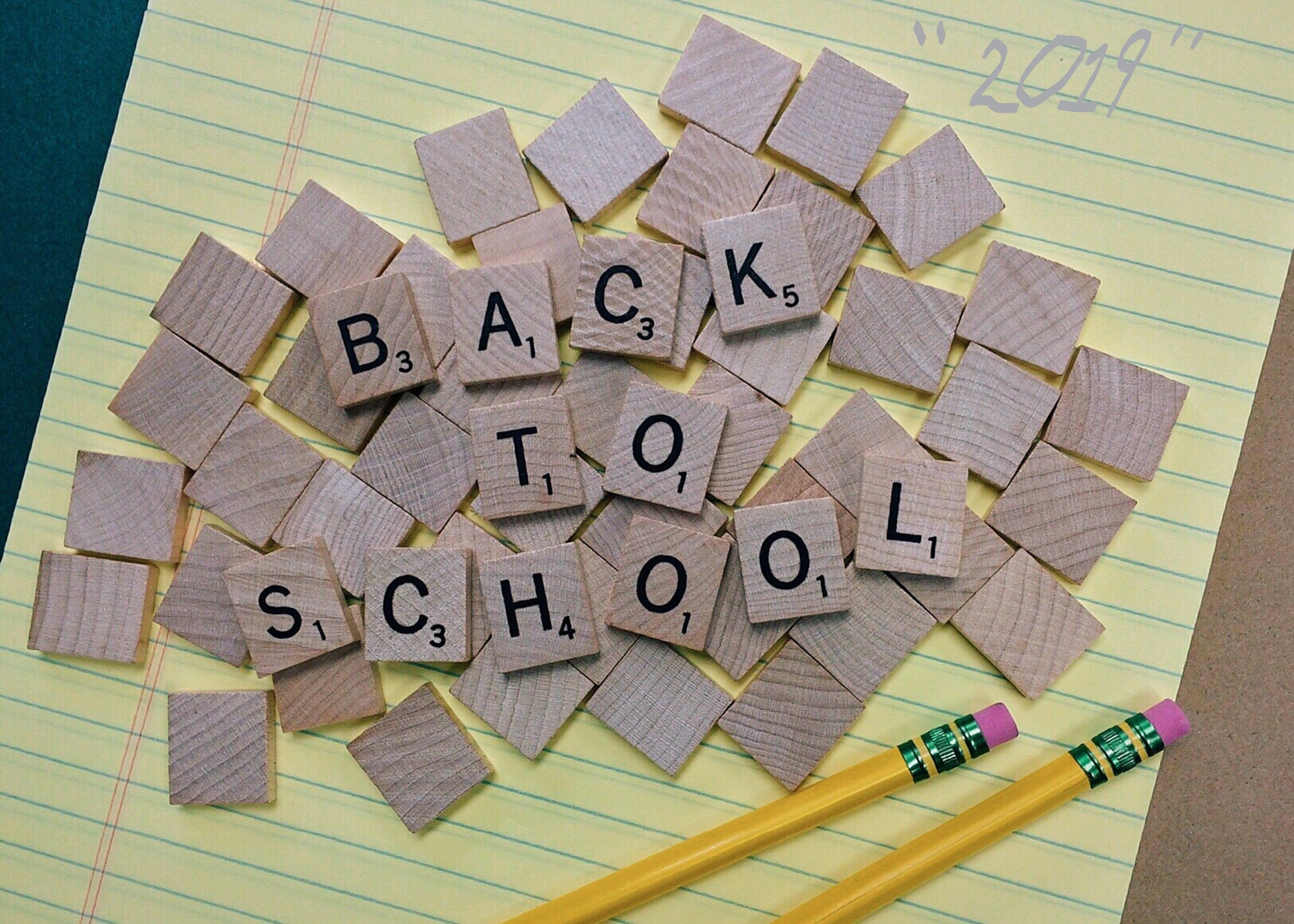 Scrabble tiles spelling back to school