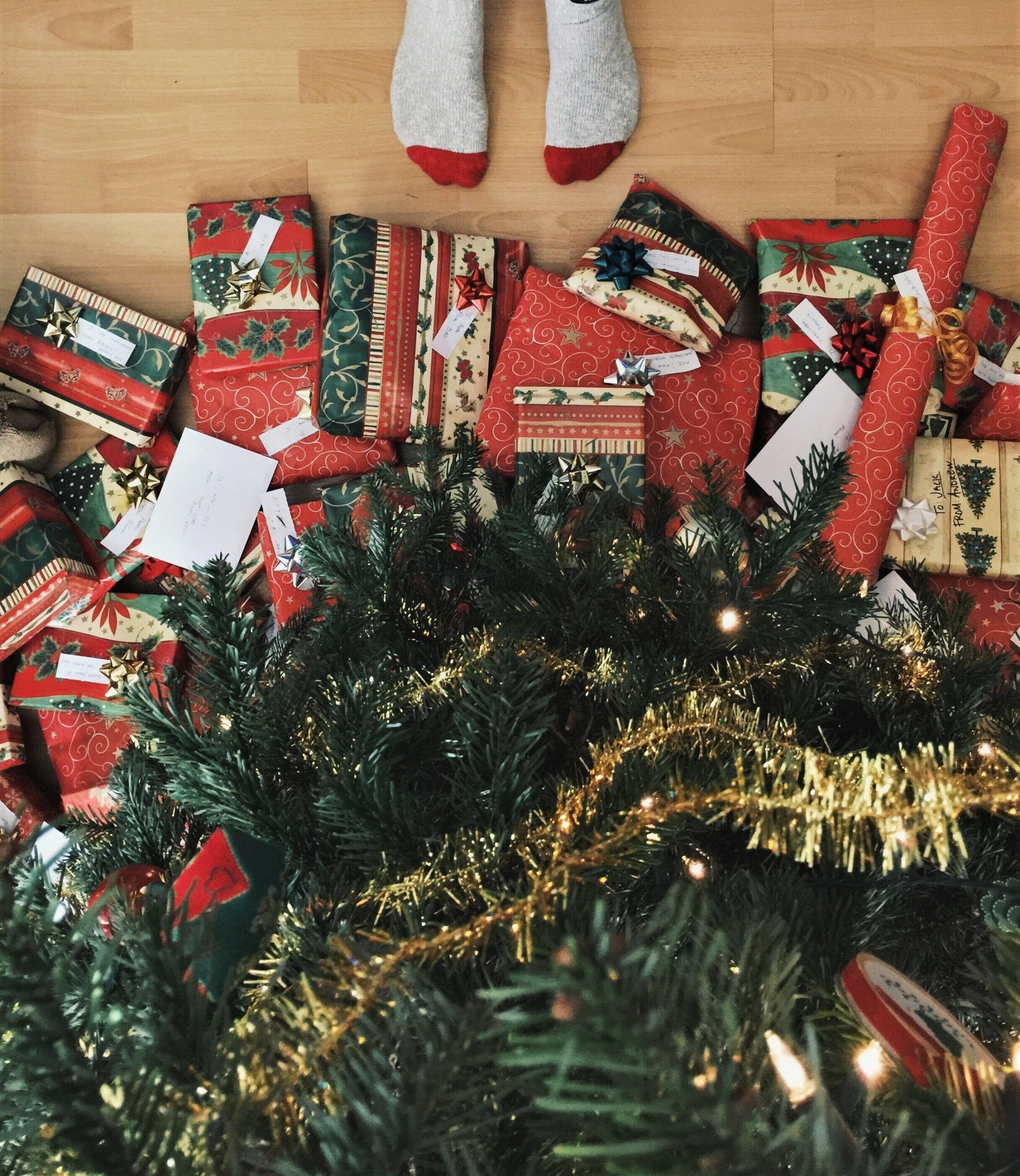 Christmas tree with wrapped presents and socks