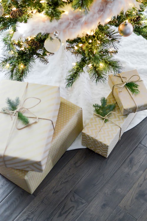 Wrapped gifts under decorated Christmas tree