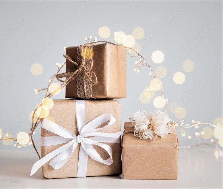 Kraft-wrapped gifts with twinkling fairy lights