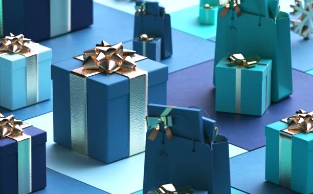 Blue and teal gift boxes with gold bows