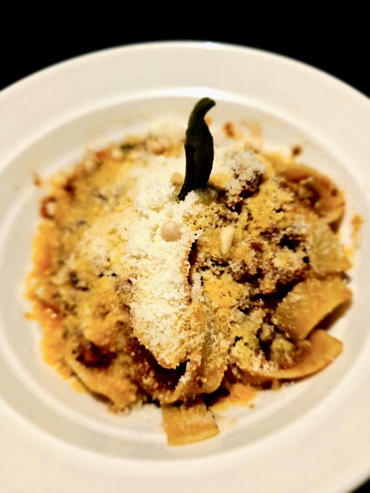 Pappardelle with ragu and grated Parmesan