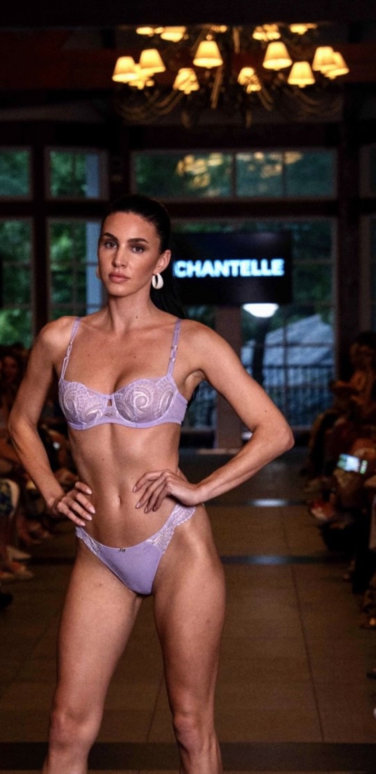 Model in lavender lingerie on runway