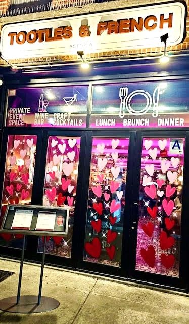 Tootles and French storefront adorned with hearts