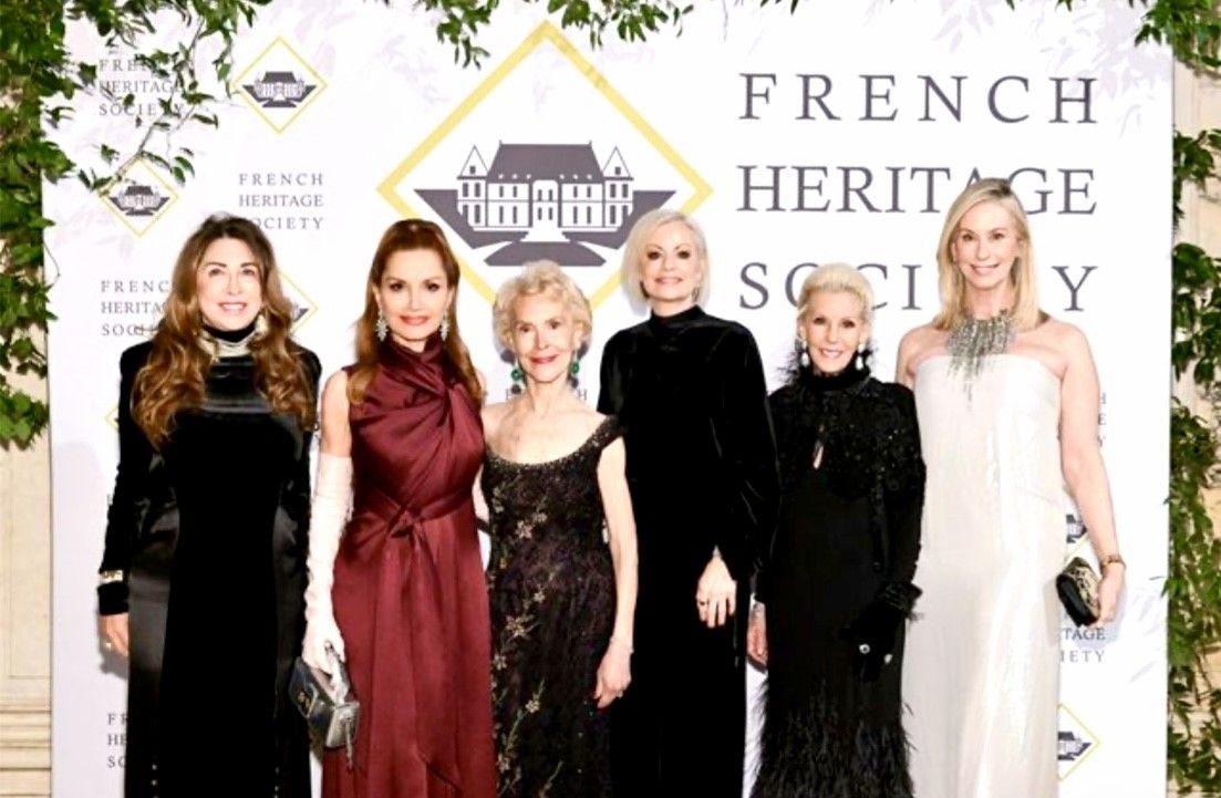 Women in formal gowns at French Heritage gala