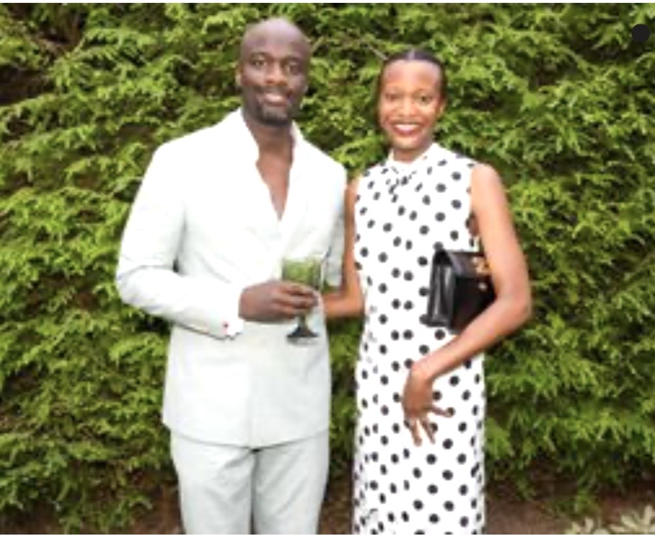Smiling couple, woman in polka-dot dress